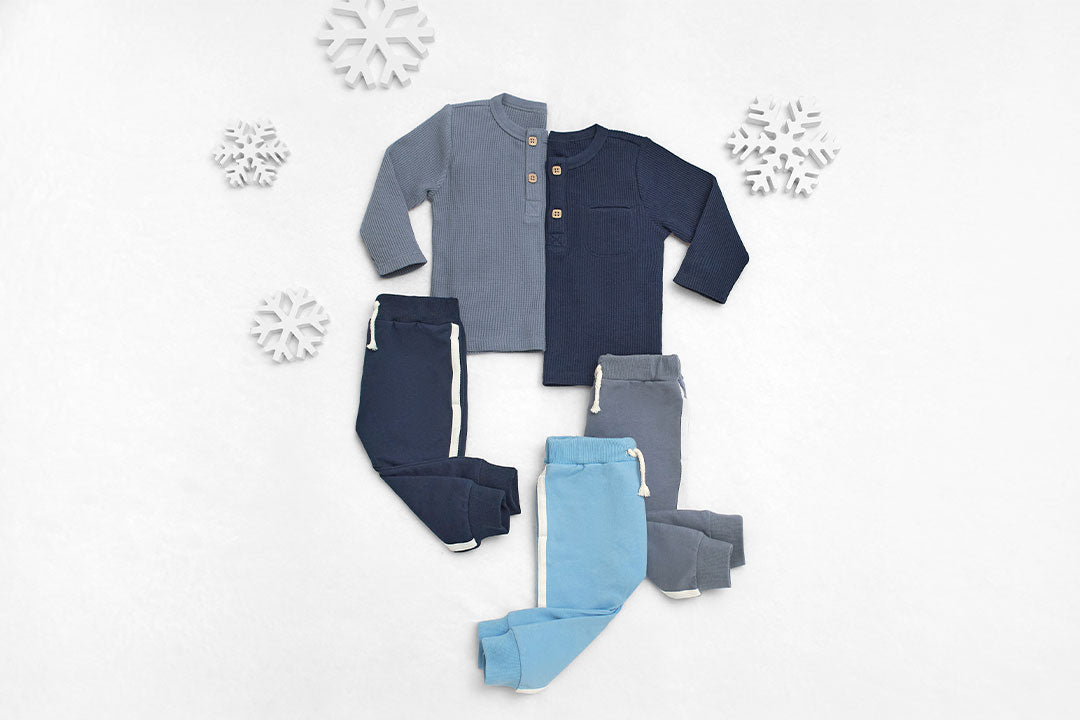  Adorable baby boys' blue and grey outfit set featuring snowflakes.