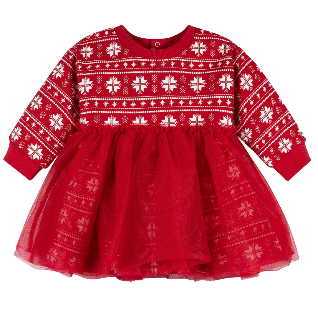 Red dress with white snowflake pattern on a white background