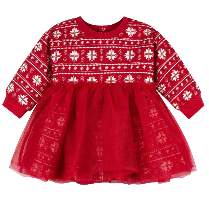 Red dress with white snowflake pattern on a white background