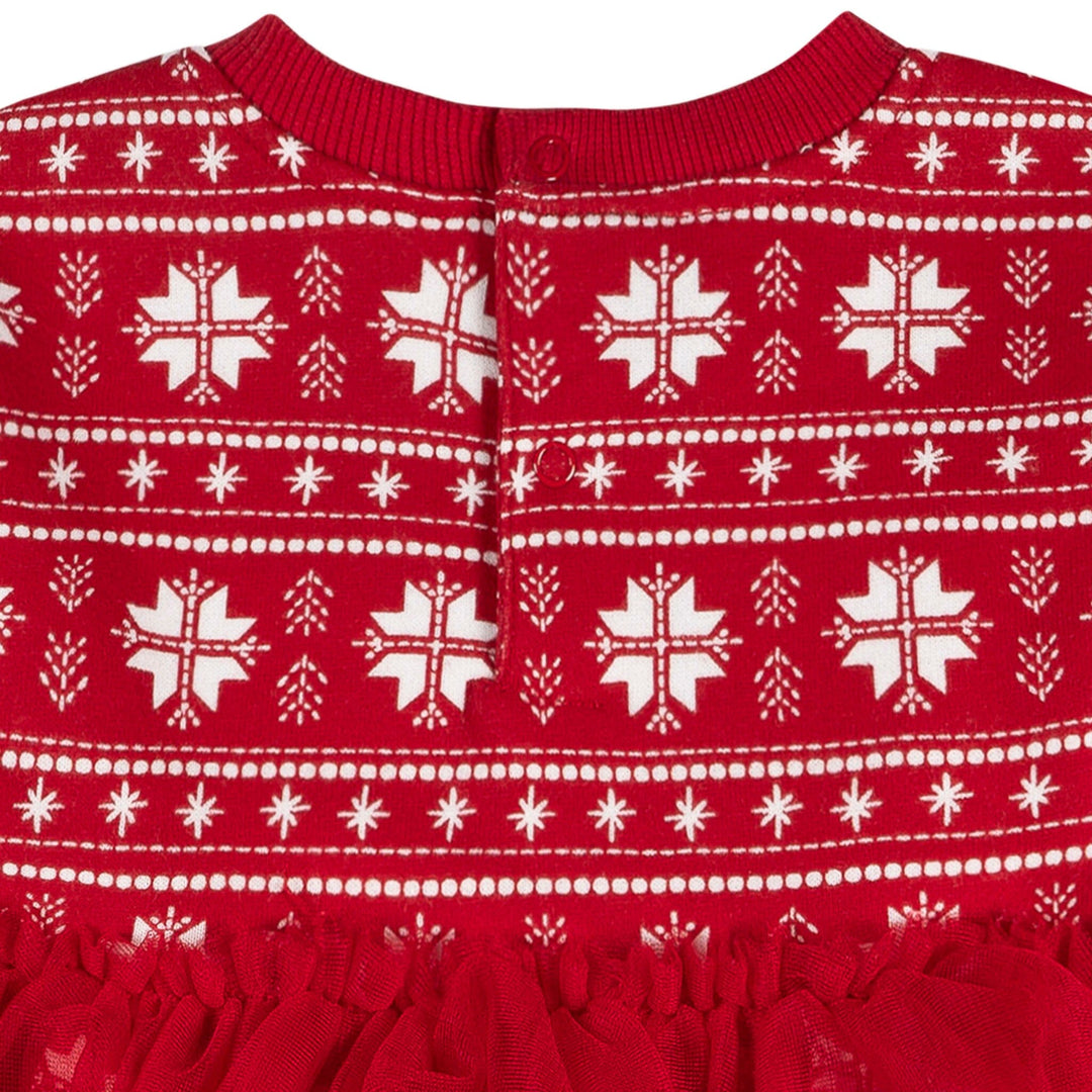 Red garment with white snowflake pattern