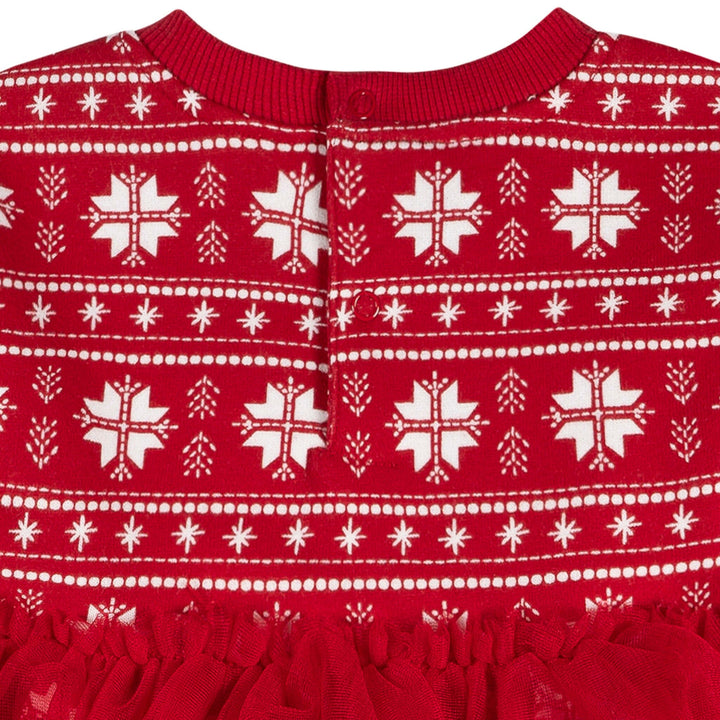 Red garment with white snowflake pattern