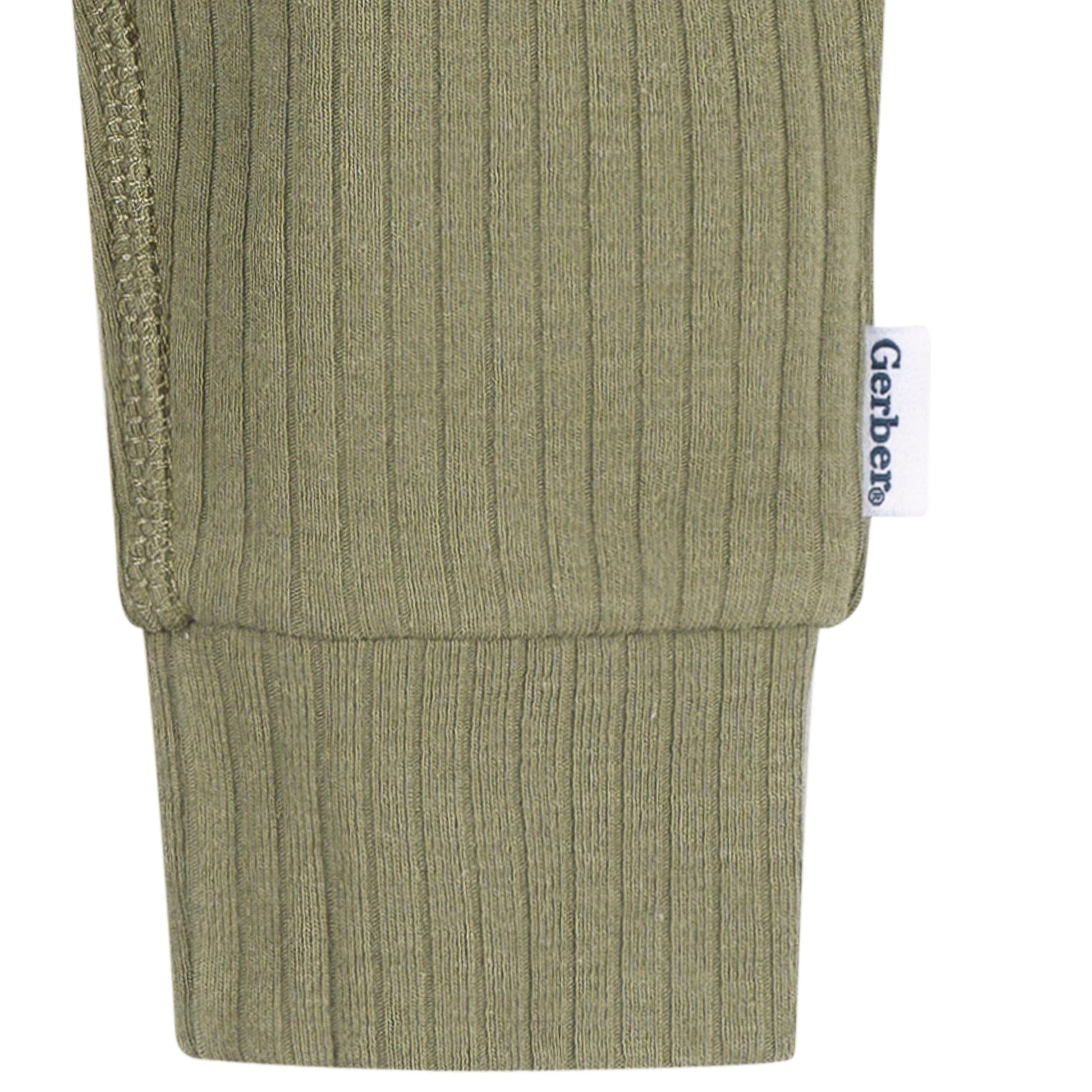 Green ribbed baby leg warmers with a visible Gerber label on a white background