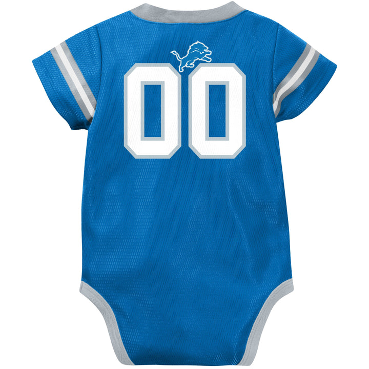 Blue baby onesie with white lettering on a white background