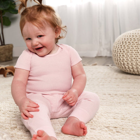 2-Piece Baby Girls Chalk Pink Onesies® Bodysuit and Pants Set
